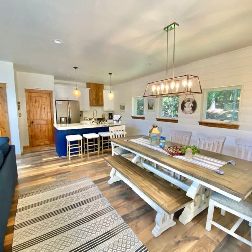 The open and roomy dining area provides the perfect opportunity to extend your gatherings into the adjacent kitchen space.