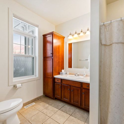 Bedroom #1 boasts a comfortable king sized and large whirlpool tub with en suite bathroom.