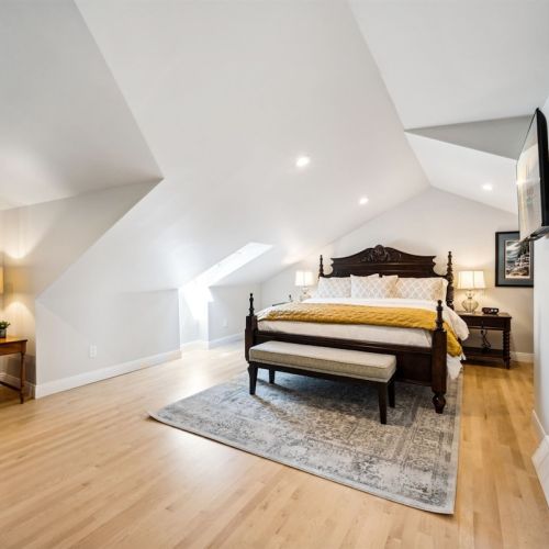 Our second-floor King suite features a King bed, a full-sized daybed, and an ensuite bath.