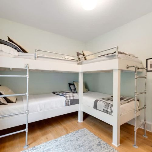 The aviation themed bunk room features two twin-over-twin bunk beds perfect for the whole family.