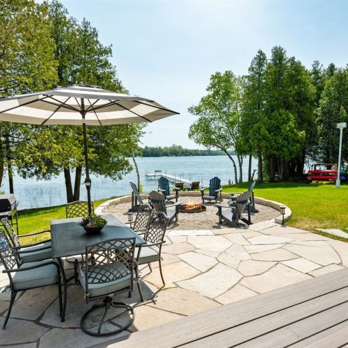 Enjoy our lakeside deck, patio, and entertainment space.