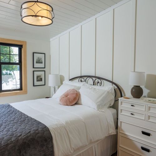 The second queen bedroom also has lake views and a smart tv.