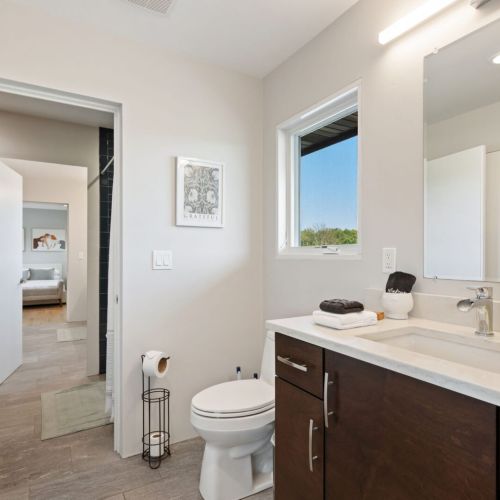 Additional half bathroom with access to jack-and-jill shower/tub combination.