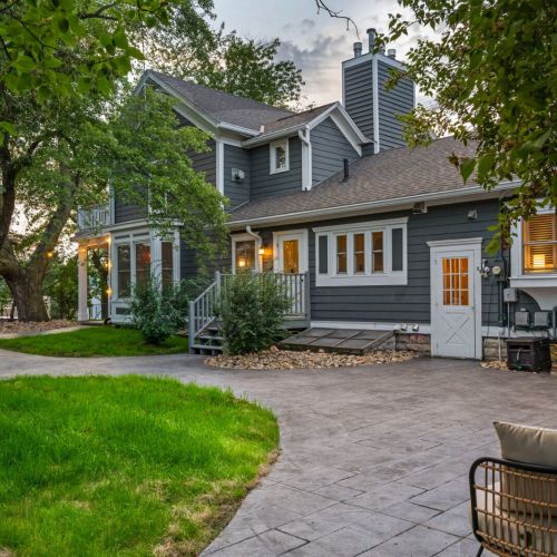 Our courtyard serves as a private oasis for our Historic Corner House guests. Semi-private staircase serves as the back entrance to our Postcard and Arbor Suites.