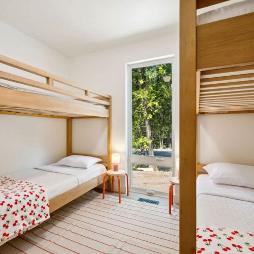 Featuring two twin-over-twin bunks and playful bedding, the third bedroom is perfect for younger guests or groups of friends.