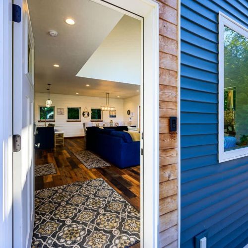 Front entrance leading to the first floor common area and kitchen.