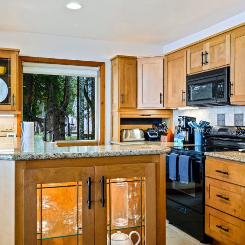 Discover the joy of cooking in this well-appointed kitchen at Sandvik House, designed to inspire the chef in you.