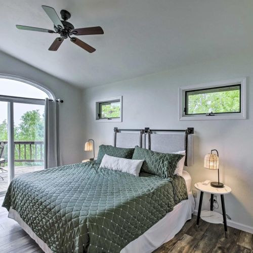 Master bedroom with King bed, beautiful views and direct access to the outdoor patio, and updated en-suite with washer and dryer.