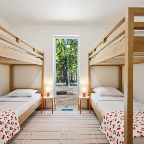 Featuring two twin-over-twin bunks and playful bedding, the third bedroom is perfect for younger guests or groups of friends.