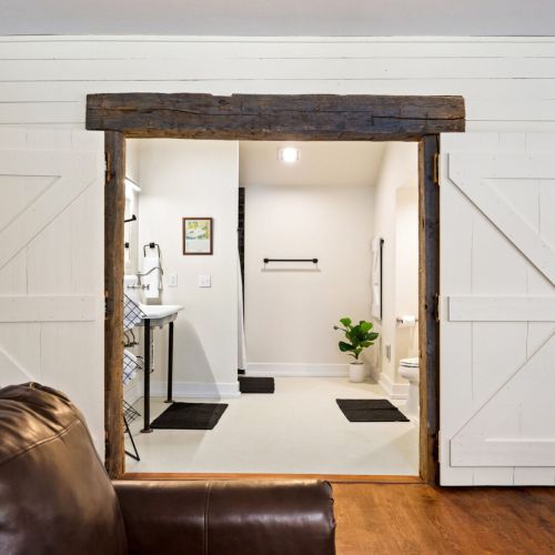 The lower level bathroom features a shower and old-style farmhouse sink.  All of the plush towels you need for your stay will be provided.