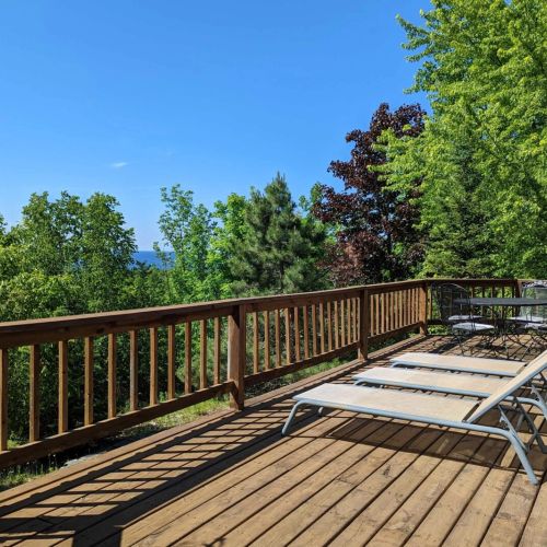 Unwind and lounge on the expansive wrap-around porch. Whether you're soaking up the sun's rays or immersing yourself in a good book, this is the perfect spot for relaxation.