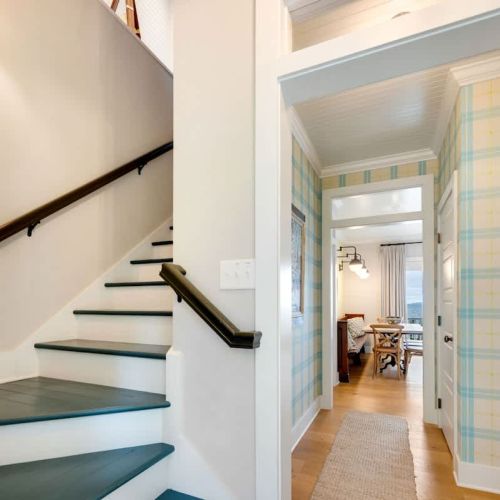 Heading back toward the front of the home, the second level reveals a private master suite.