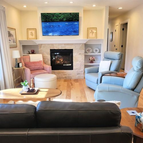 The spacious living room has a beautiful gas fireplace and comfortable recliners.  Relax and put your feet up!