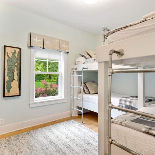 The aviation themed bunk room features two twin-over-twin bunk beds perfect for the whole family.