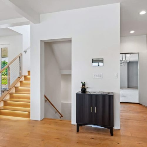 Heading upstairs to the second level, you'll find the main sleeping area with three additional bedrooms.