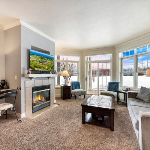 Relax in cozy comfort with an indoor fireplace and sleeper sofa for additional guests. Enjoy views of the grounds and outdoor seating on your own private deck/patio.