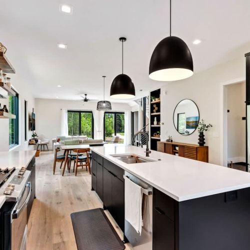 The chef's kitchen is a culinary haven, equipped with state-of-the-art appliances and an abundance of counter space for your gourmet creations.