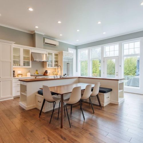 Gourmet Kitchen & Dining Experience: Our kitchen is a chef's delight, equipped with high-end Jenn-Air appliances that cater to all your culinary needs. The spacious layout features ample white cabinetry for storage, sleek countertops for meal prep, p