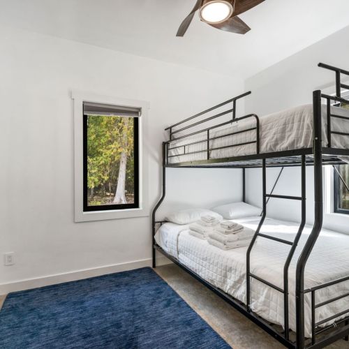 Bedroom #4 features a full over queen bunk, perfect for kids and teens.