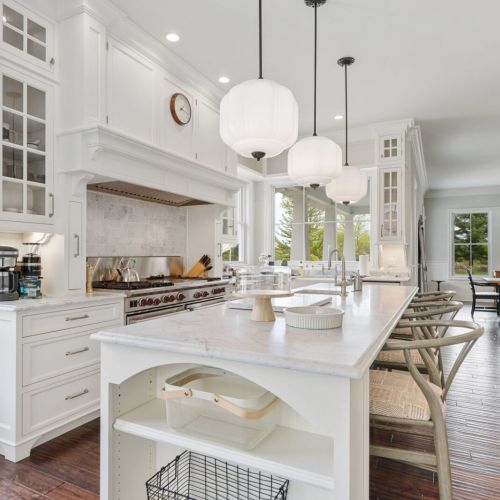 Enjoy coffee and  conversation at the large kitchen island.