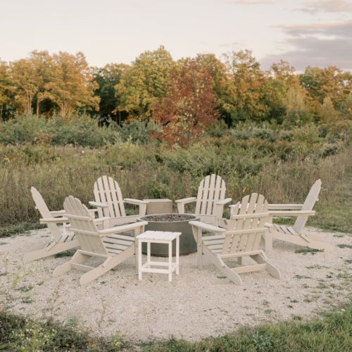 The fire pit is a favorite spot for evening conversations and stargazing, while the private mowed trail winding through the property offers a quiet place for a morning walk or peaceful reflection.