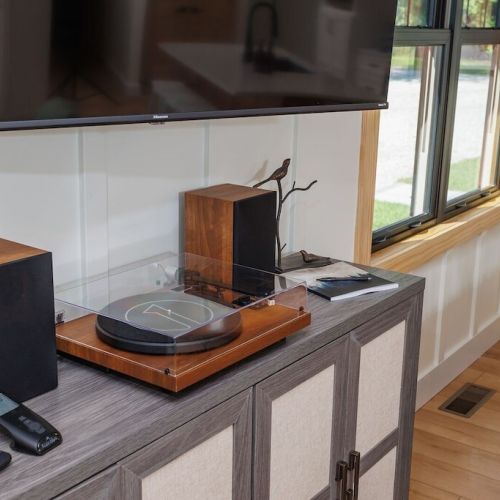 Enjoy the record player and vinyl music library.