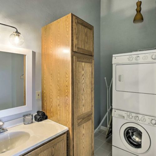 Enjoy direct and private access to the Master bathroom en-suite, complete with washer and dryer.