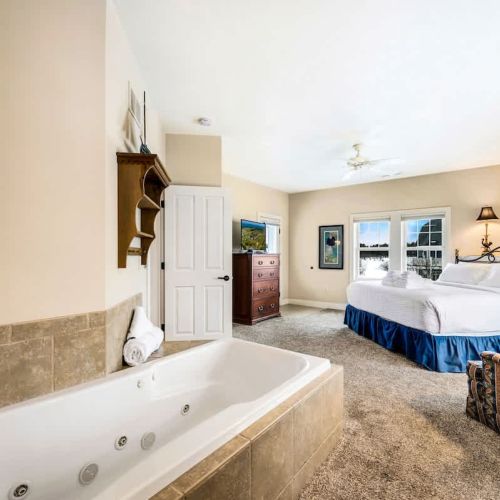 Bedroom #1 boasts a comfortable king sized and large whirlpool tub with en suite bathroom.