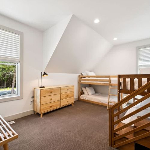 Kid's bunk room with 2 twin-over-twin bunk beds.