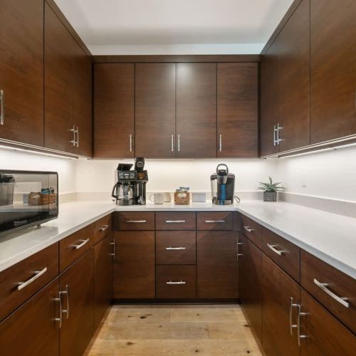 Coffee bar complete with drip-coffee maker and Keurig single-cup coffee maker.