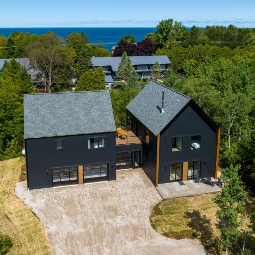 Welcome to the Nordica House and Loft, a modern and design-driven retreat located in the heart of Egg Harbor. This spacious property features a den, 5 bedrooms, 4 bathrooms, and offers a perfect balance of style and guest comfort.