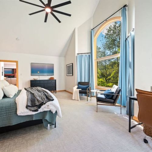Enjoy sweeping views of the property while relaxing in the primary king bedroom.