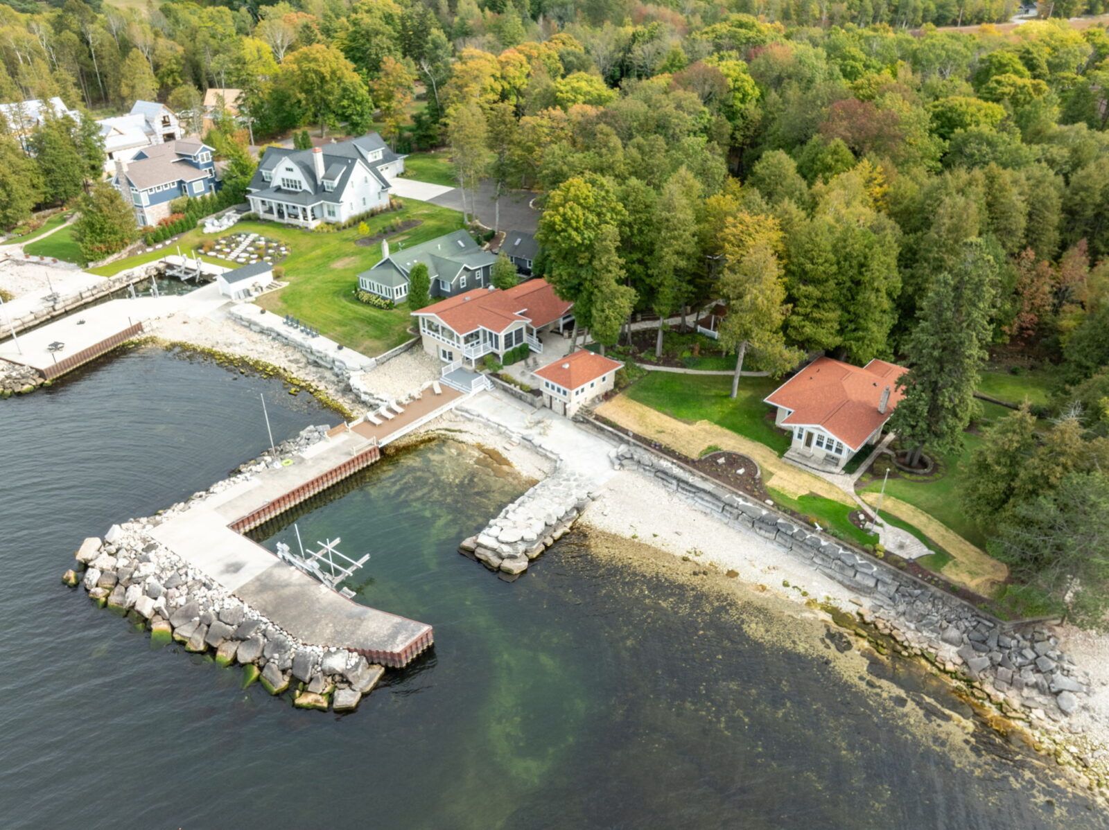 Discover the ultimate getaway at Three Leaves and the Bayside in Egg Harbor, Wisconsin. Perfect for families or small groups, this unique property features 2 charming cabins, sauna and stunning waterfront views.